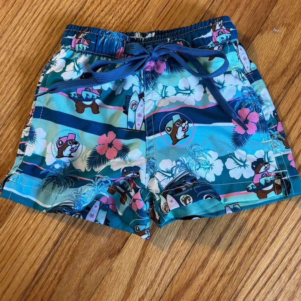 Buc-ee's Toddler 6-9 M Swim Trunks Hawaiian Palm Trees Surfing Floral Teal Green